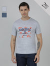 Man wearing a pack of 2 typography printed cotton slim fit t-shirts on a light gray background