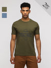 Man wearing a pack of 2 typography printed round neck cotton slim fit t-shirts on a light gray background