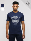 Man wearing a typography printed pack of 2 round neck cotton slim fit t-shirts on a light gray background