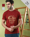 Man wearing a typography printed cotton slim fit pack of 2 t-shirts on a light gray background