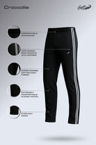 Black pants with white stripes on a gray background, featuring Crocodile branding.