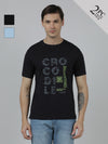 Man wearing a pack of 2 typography printed slim fit cotton t-shirts on a light gray background