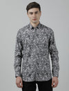Man wearing a grey grey printed full sleeve casual shirt with casual styling on a gray background