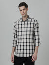 Man wearing a white white checked casual full sleeve 100% cotton shirt on a light gray background